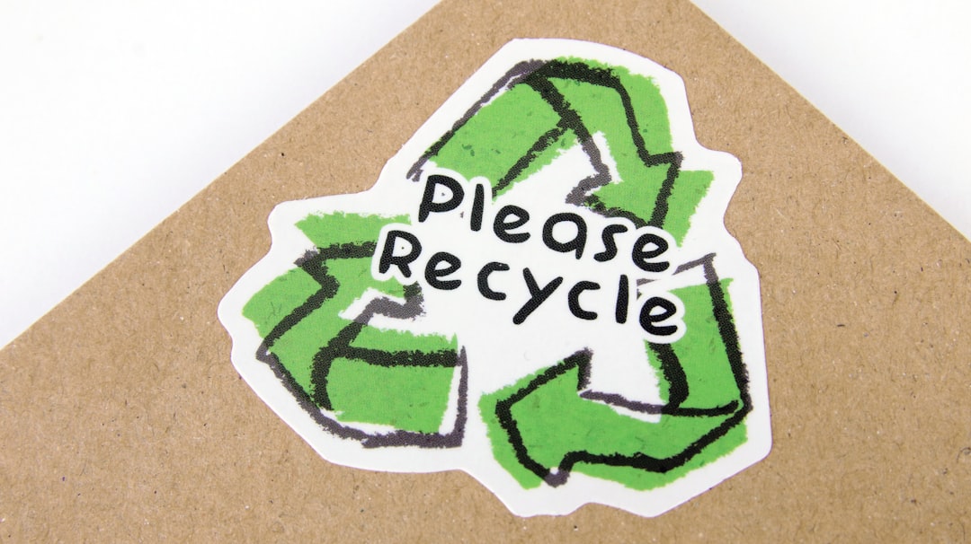 services-02 Die cut biodegradable paper sticker with please recycle logo applied to kraft paper envelope